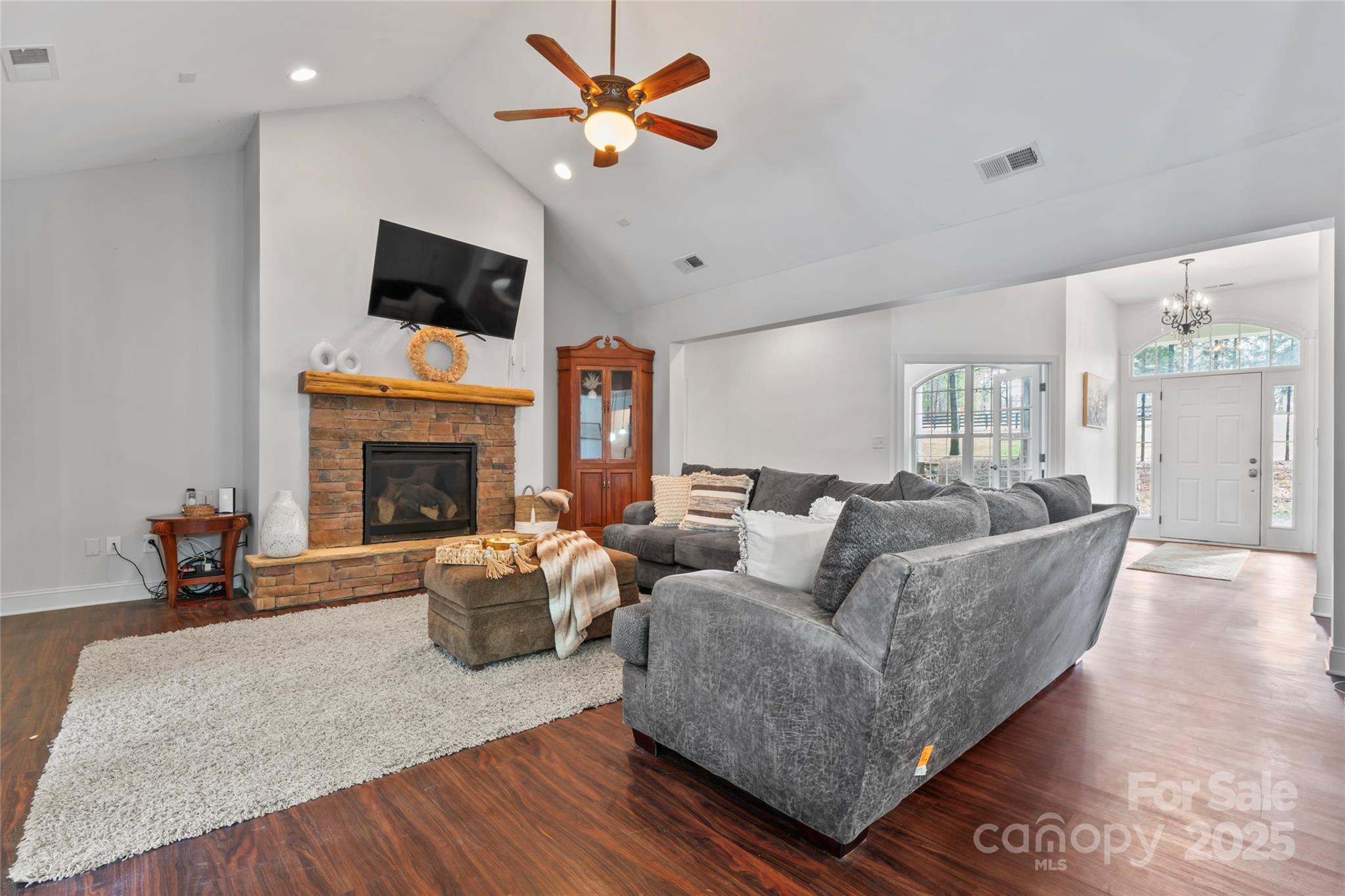 1485 State Rd S-46-1102 York, SC 29745 - Photo 9 of 42 a living room with furniture a fireplace and a flat screen tv