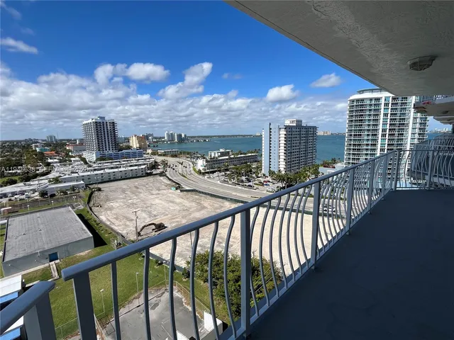 a view of a balcony with city view