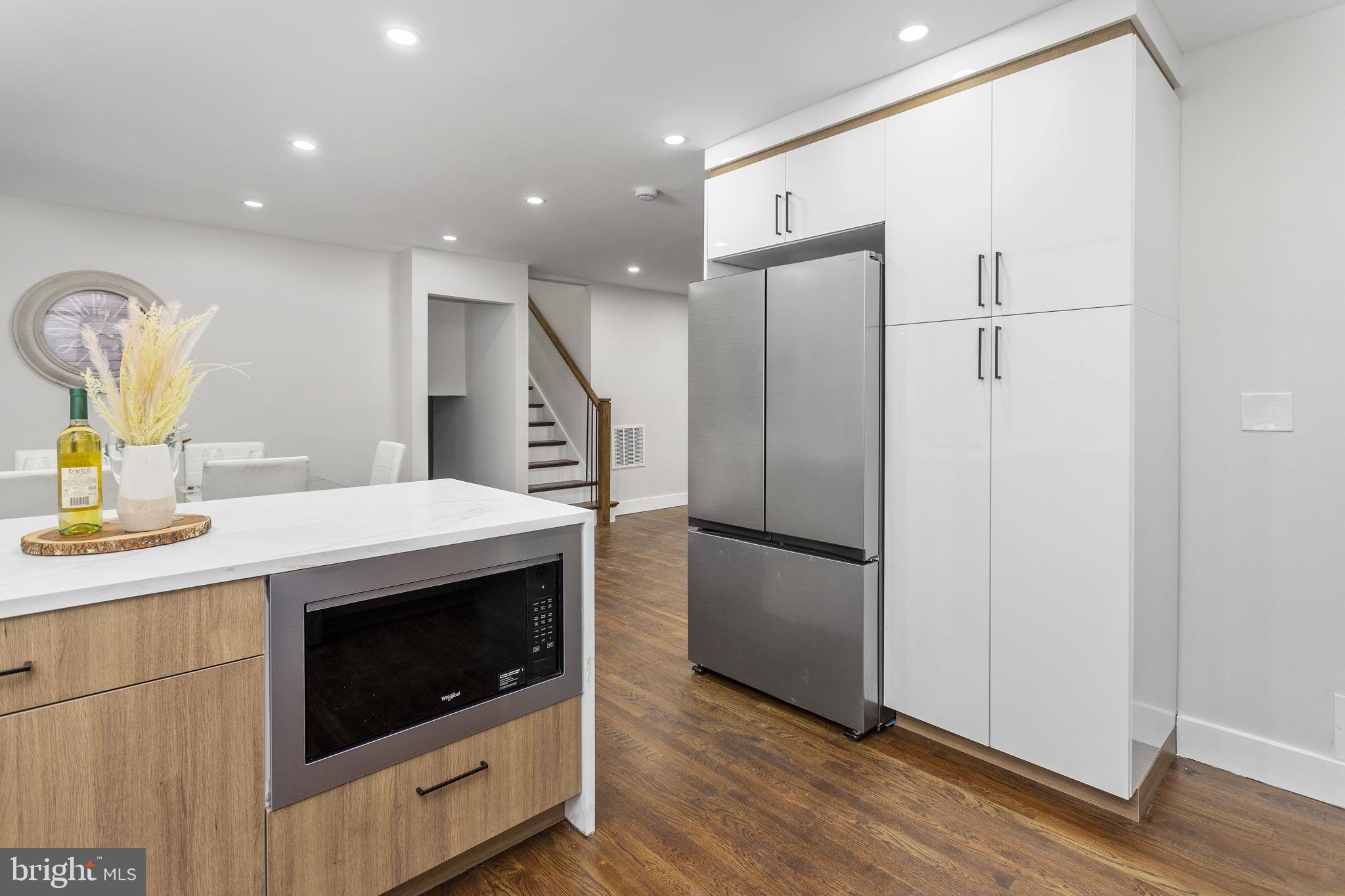 6 Ryan Road Cranbury, NJ 08512 - Photo 12 of 44 a kitchen with stainless steel appliances a refrigerator sink and microwave