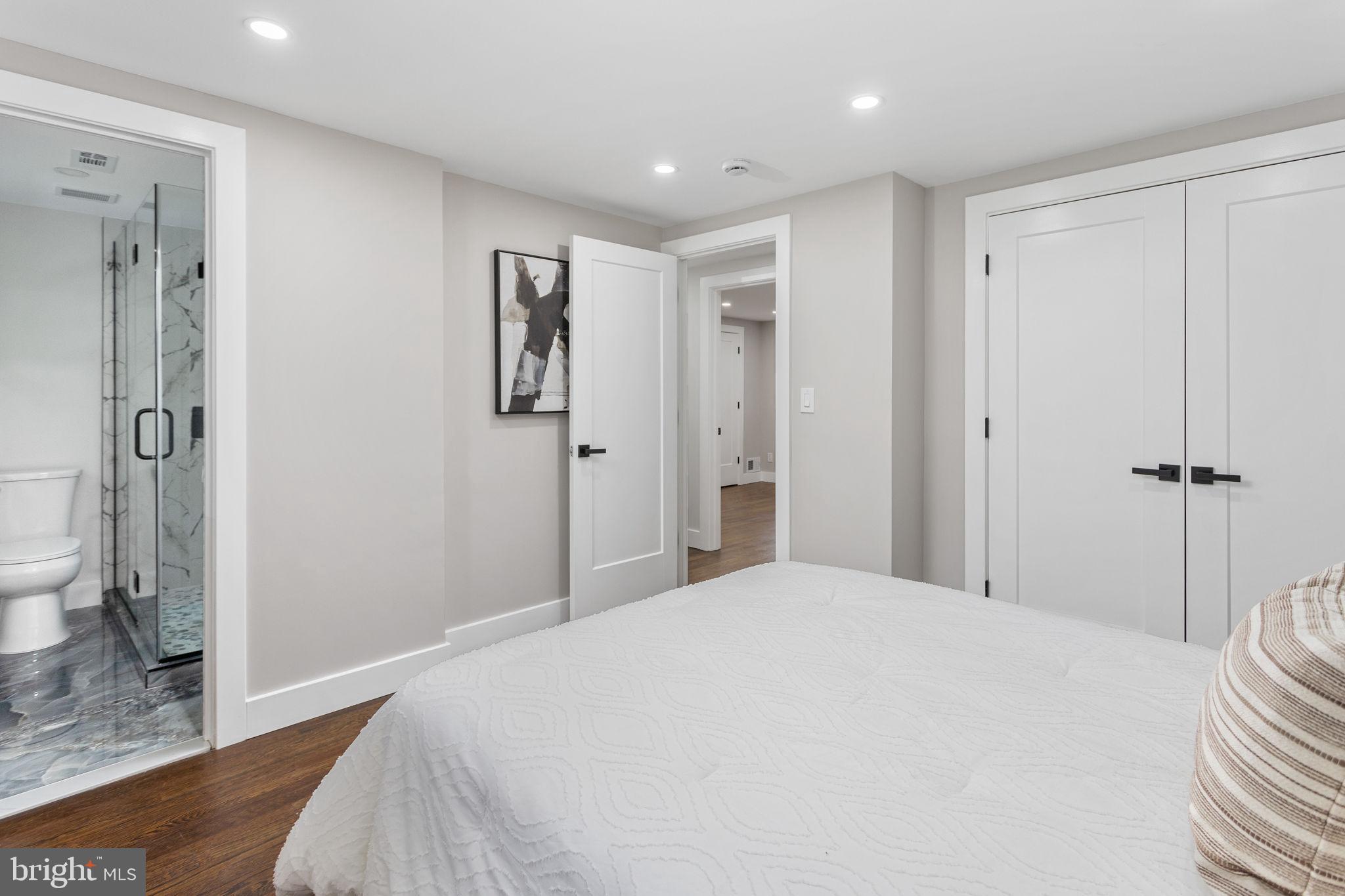 6 Ryan Road Cranbury, NJ 08512 - Photo 15 of 44 a bedroom with a bed and a shower