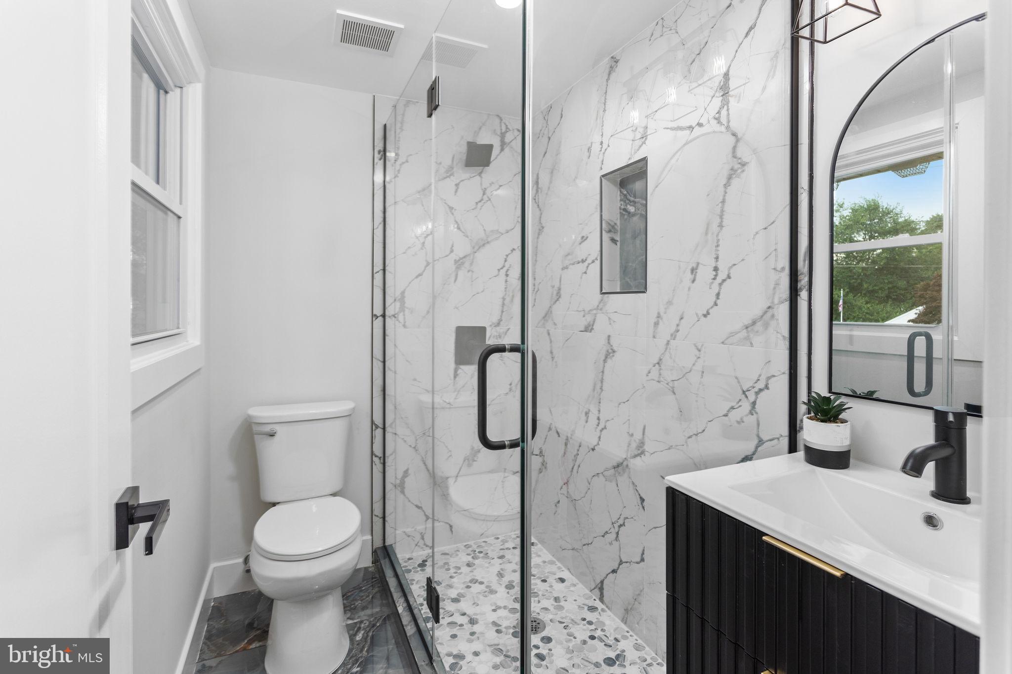 6 Ryan Road Cranbury, NJ 08512 - Photo 16 of 44 a bathroom with a granite countertop sink toilet and shower