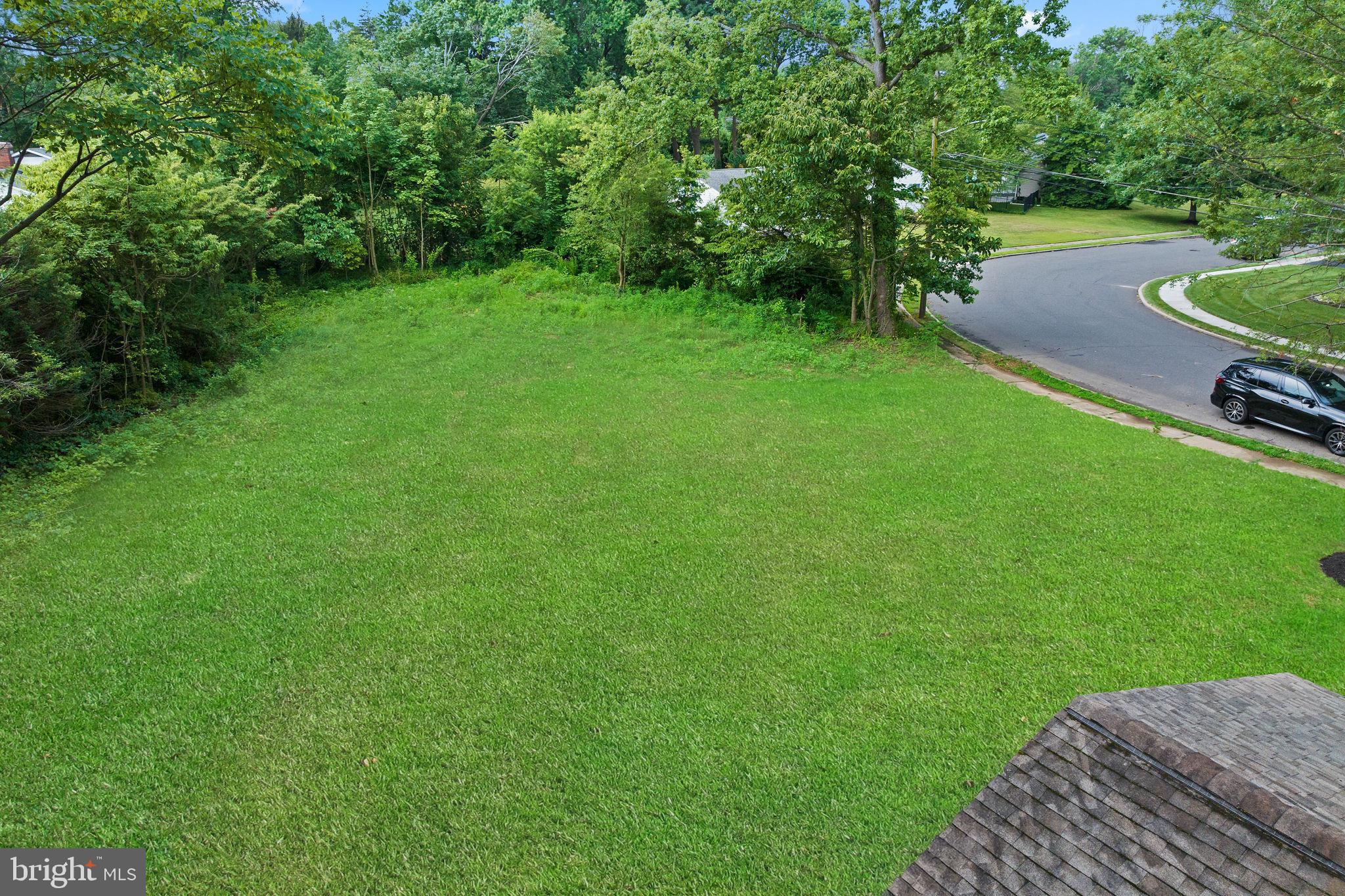 6 Ryan Road Cranbury, NJ 08512 - Photo 32 of 44 a view of a backyard with a garden