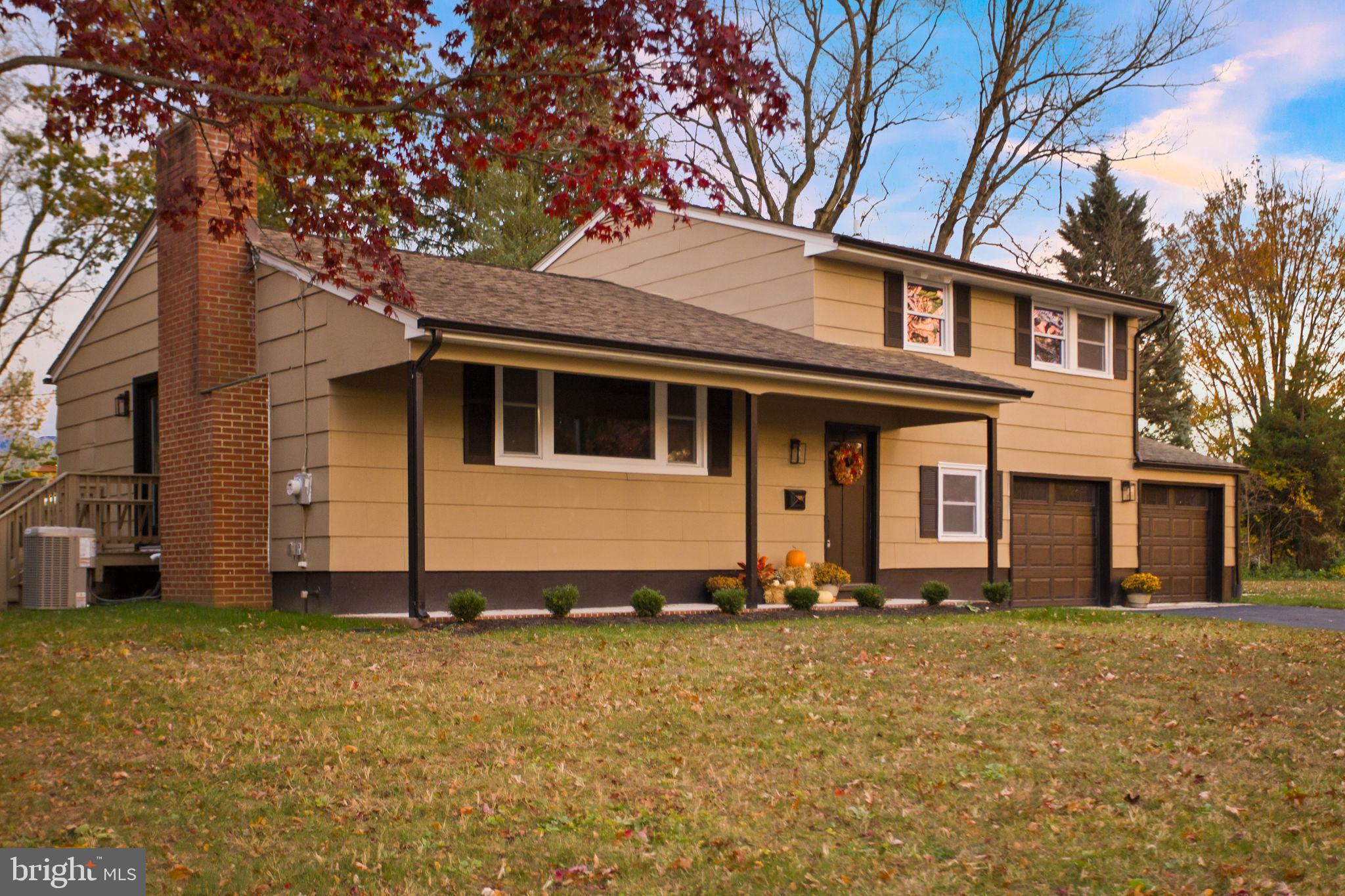 6 Ryan Road Cranbury, NJ 08512 - Photo 34 of 44 a front view of a house with a yard