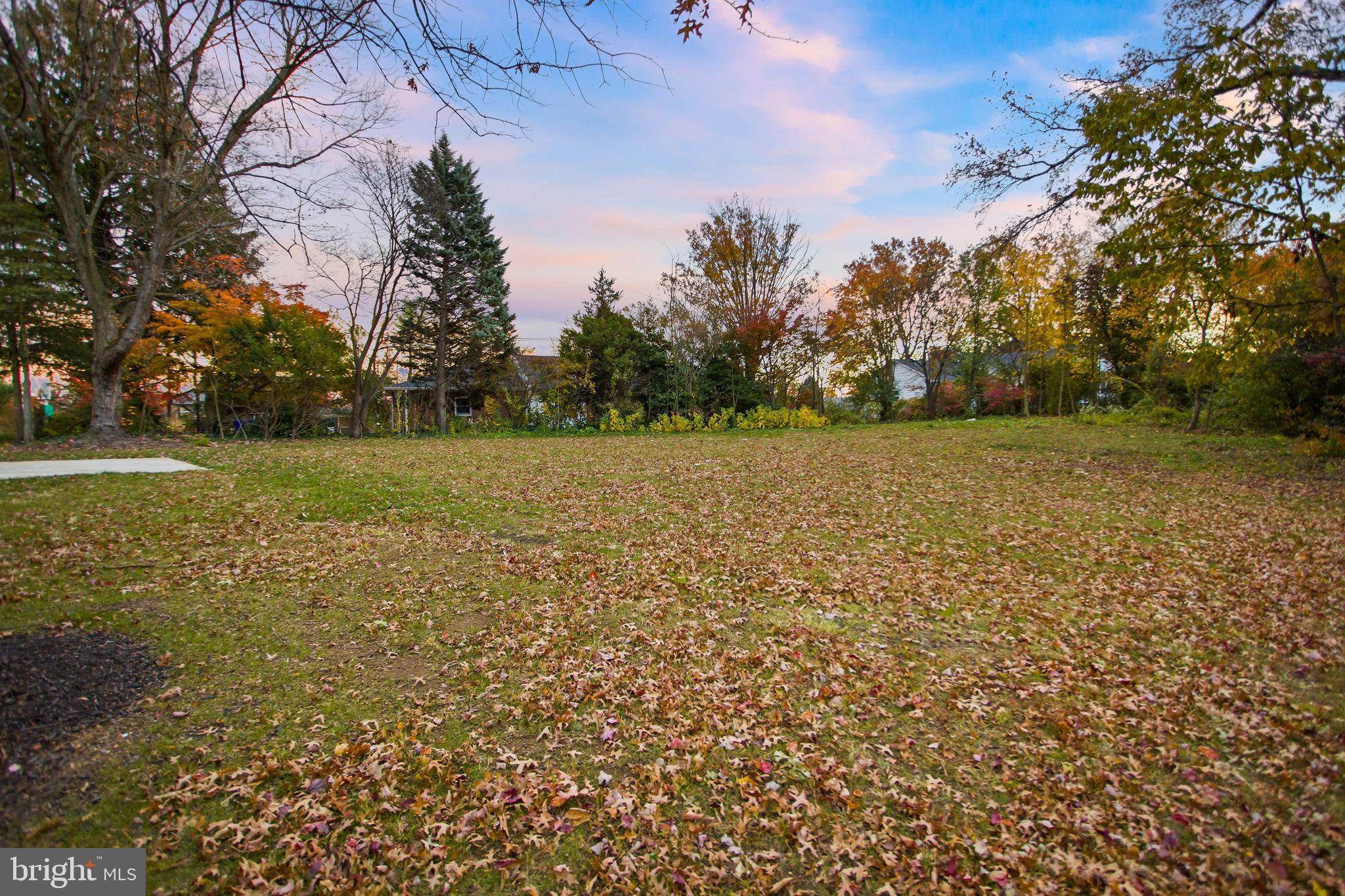 6 Ryan Road Cranbury, NJ 08512 - Photo 36 of 44 a view of a field with trees in the background