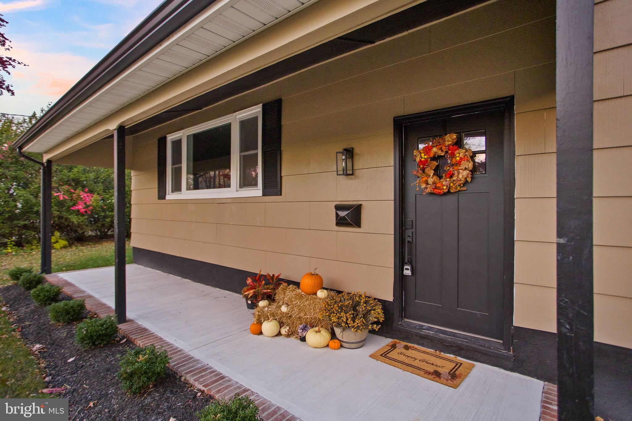 6 Ryan Road Cranbury, NJ 08512 - Photo 42 of 44 a view of a porch with furniture and floor to ceiling window