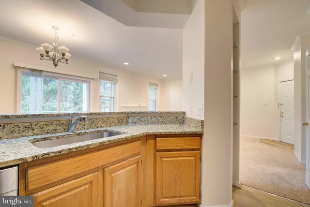 a view of a bathroom sink and window