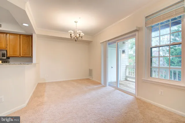 a view of a livingroom with a chandelier