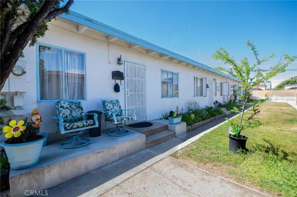 a front view of a house with patio