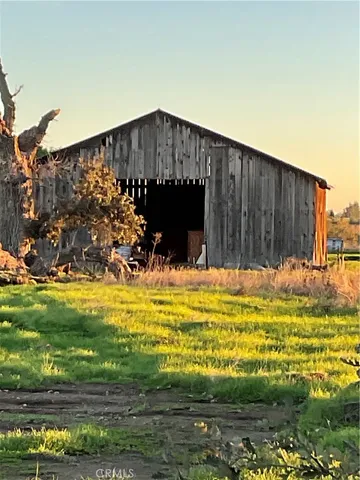a view of swimming pool with a yard