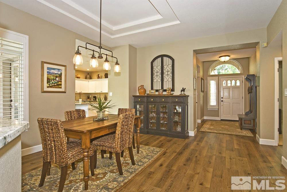 3960 Innsbruck Court Reno, NV 89519 - Photo 11 of 33 a view of a dining room with furniture window and wooden floor