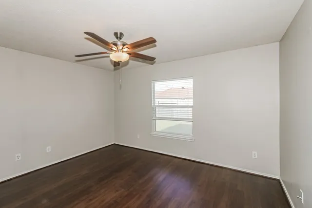 a spacious bathroom with a double vanity sink a mirror and a shower