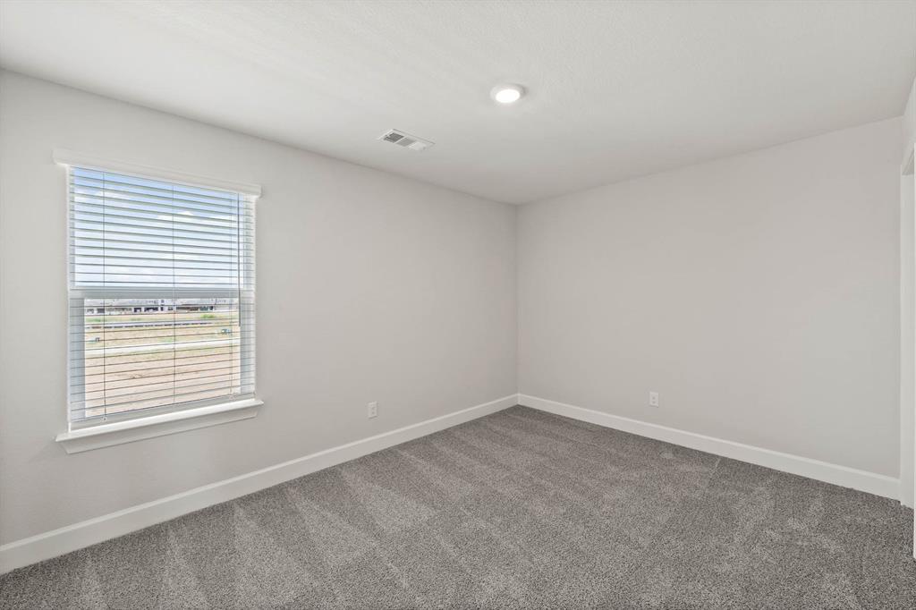 455 MB's Way Pilot Point, TX 76258 - Photo 7 of 8 an empty room with a window