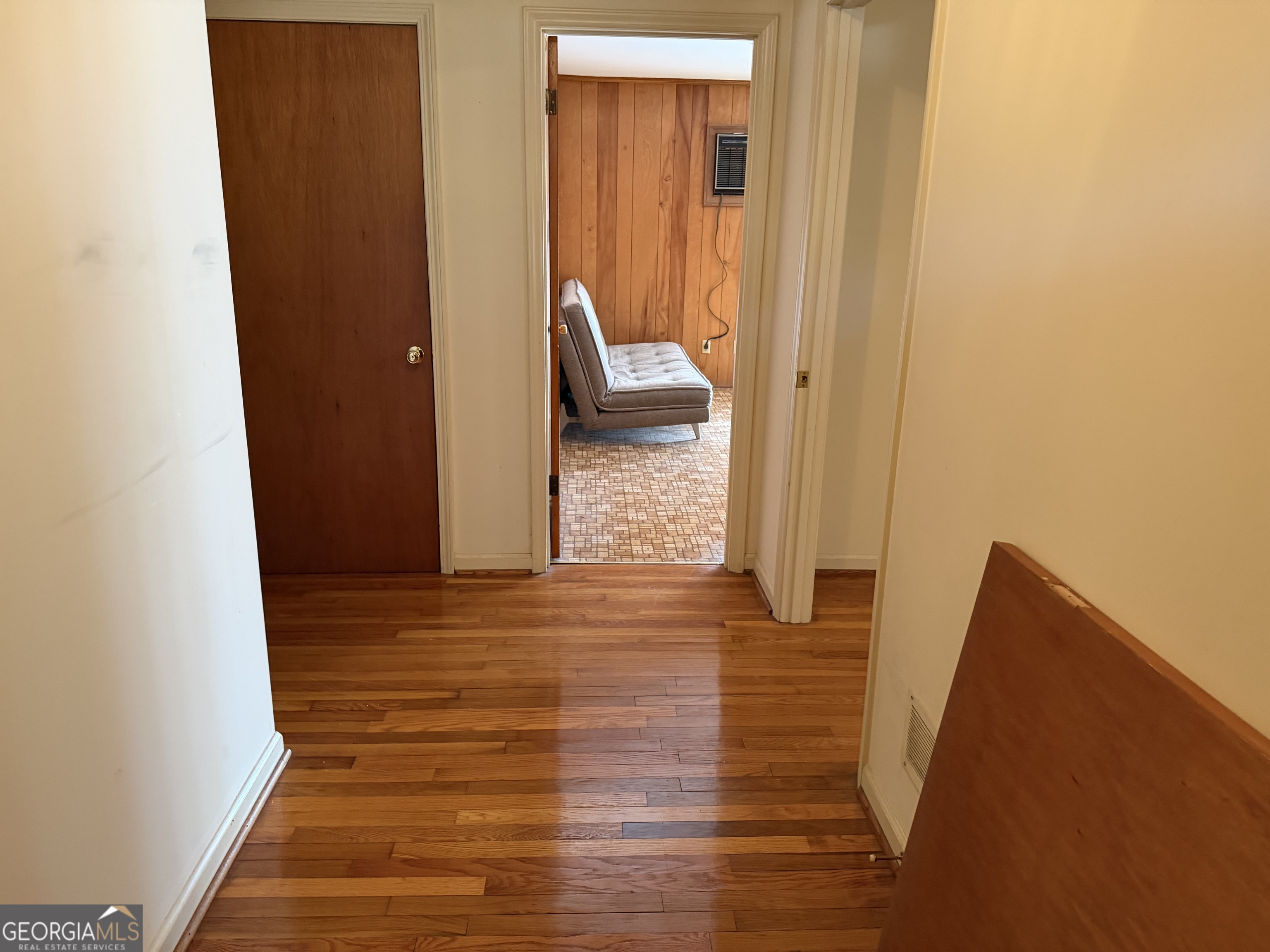 1112 Old Dalton Road Northeast Rome, GA 30165 - Photo 13 of 27 a view of hallway with stairs and wooden floor