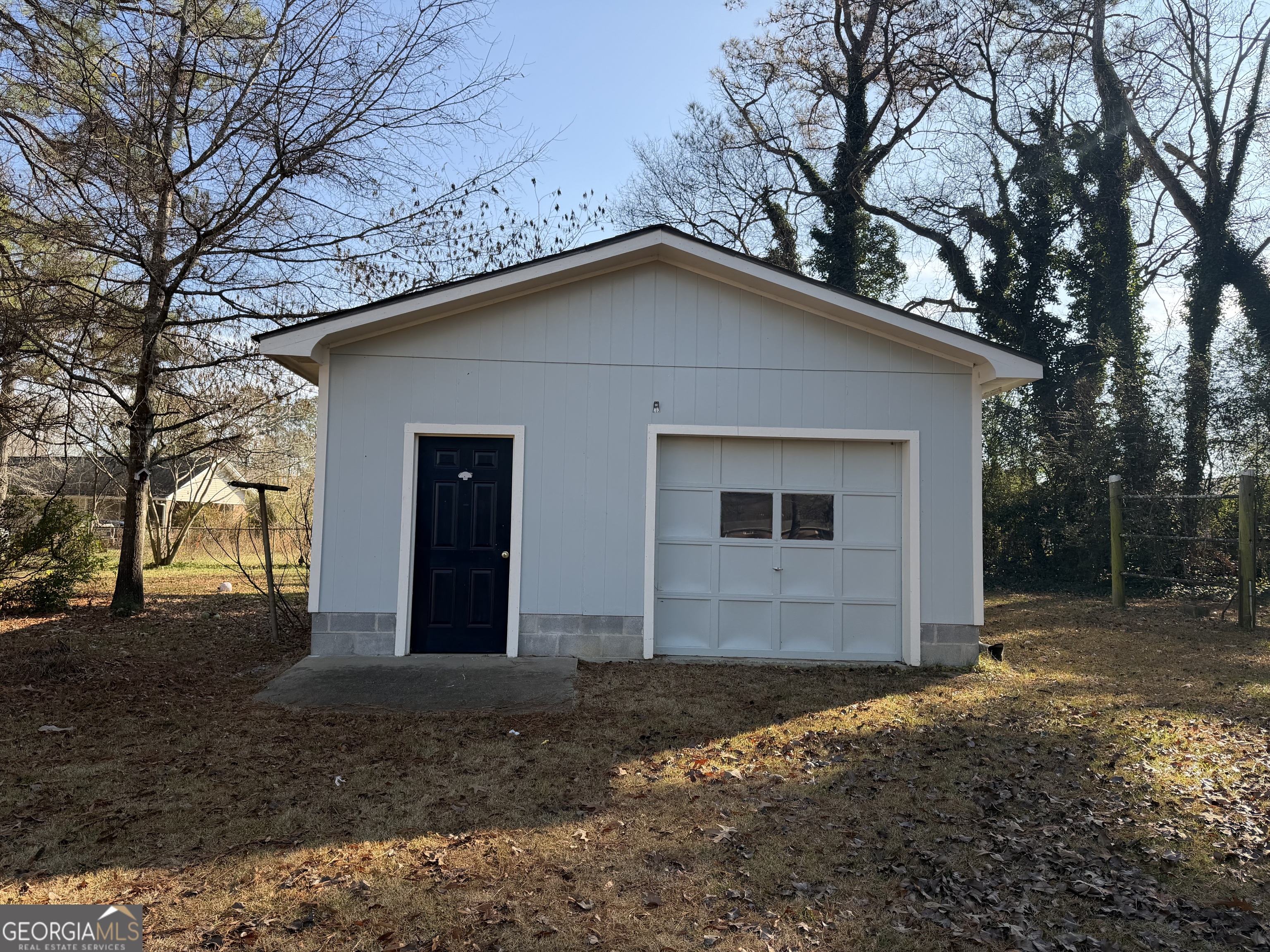 1112 Old Dalton Road Northeast Rome, GA 30165 - Photo 25 of 27 a view of a house with a yard