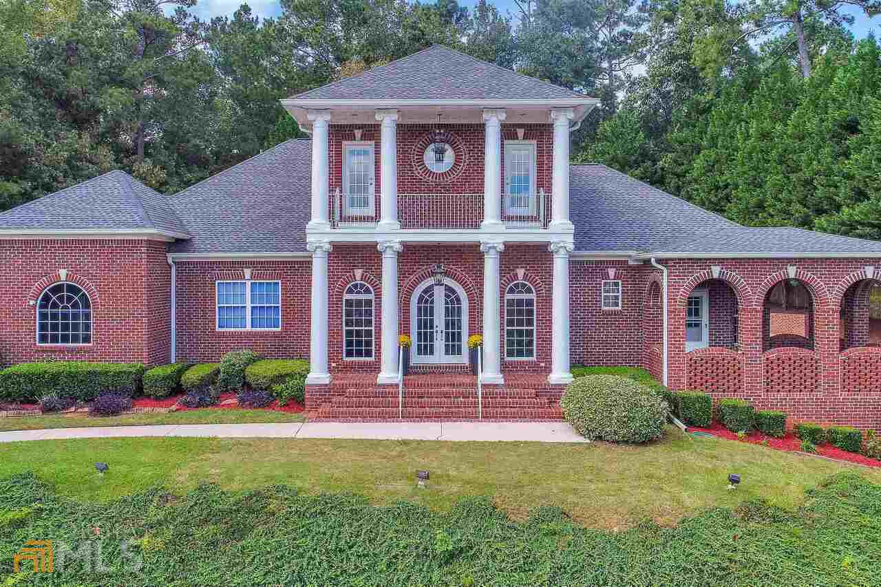 3435 Hagger Court East Point, GA 30344 - Photo 1 of 1 a front view of a house with garden