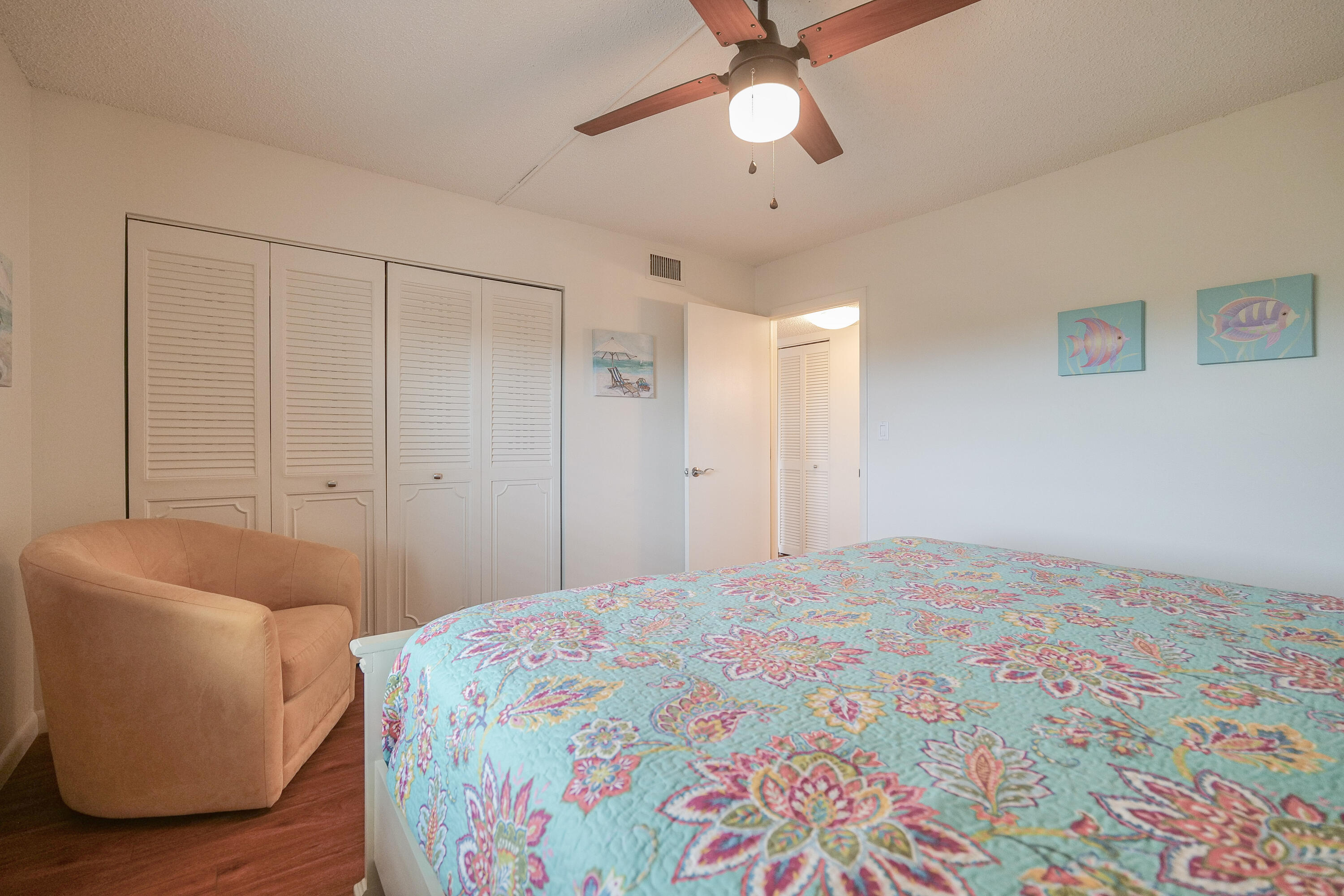 3930 Inverrary Boulevard, Unit 703D Lauderhill, FL 33319 - Photo 27 of 62 a bedroom with a bed and a couch