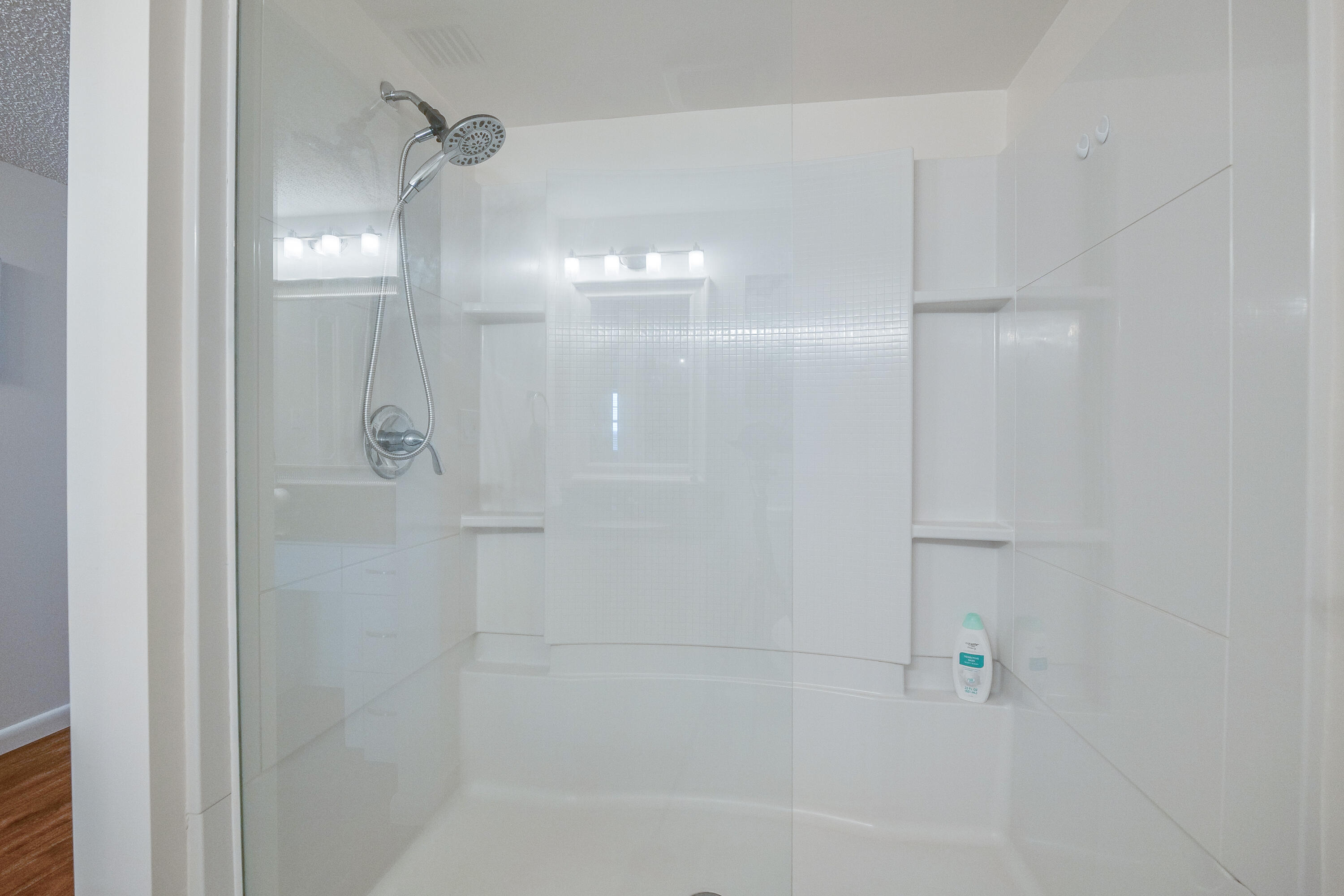 3930 Inverrary Boulevard, Unit 703D Lauderhill, FL 33319 - Photo 33 of 62 a bathroom with a shower