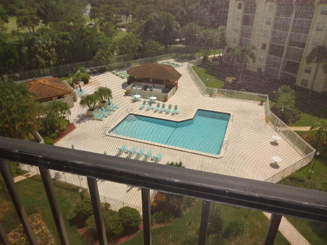 3930 Inverrary Boulevard, Unit 703D Lauderhill, FL 33319 - Photo 43 of 62 a view of a balcony with floor to ceiling windows