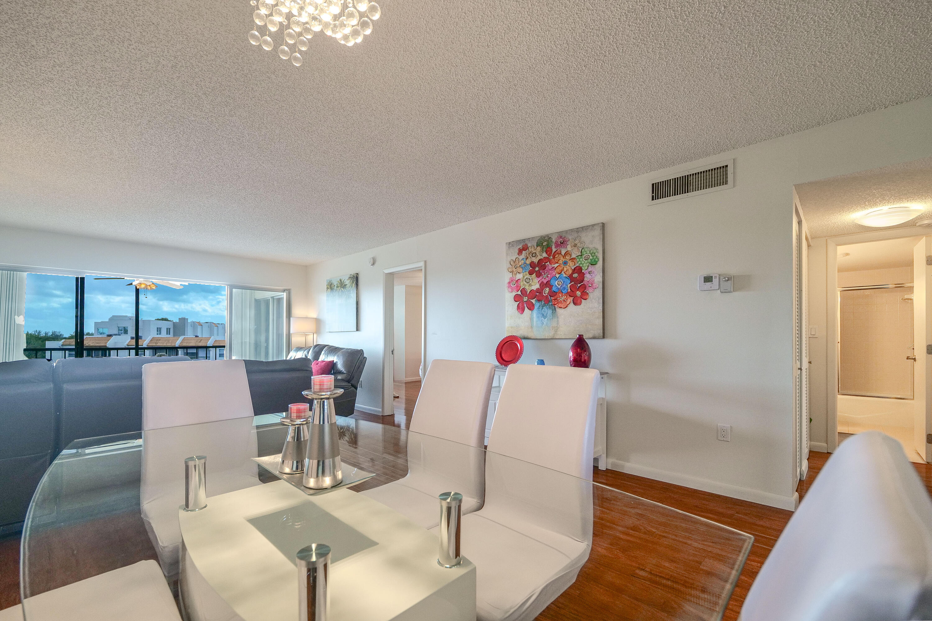 3930 Inverrary Boulevard, Unit 703D Lauderhill, FL 33319 - Photo 6 of 62 a view of a dining room with furniture