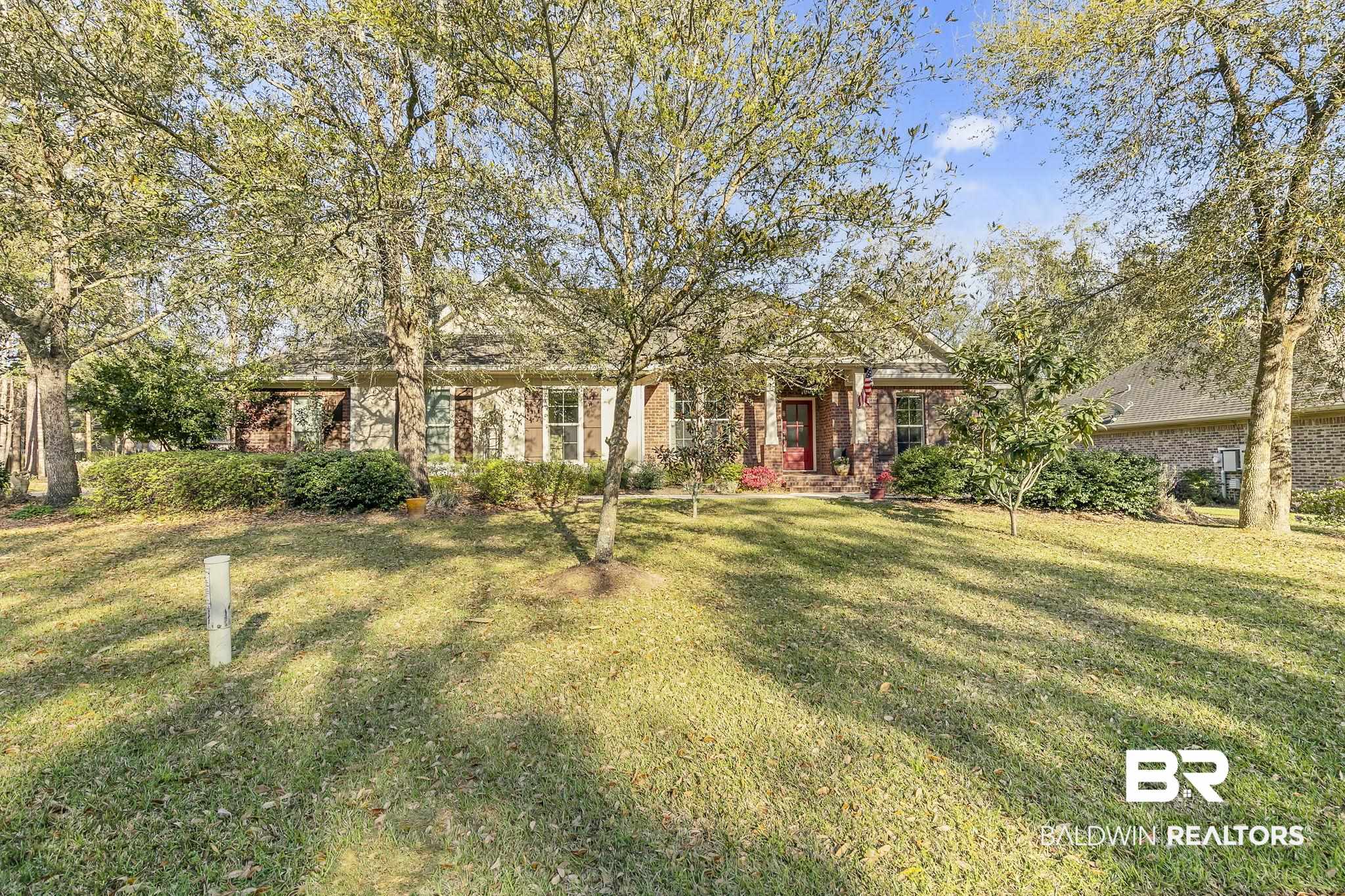 20105 Bunker Loop Fairhope, AL 36532 - Photo 58 of 65 View of front of property with a front lawn