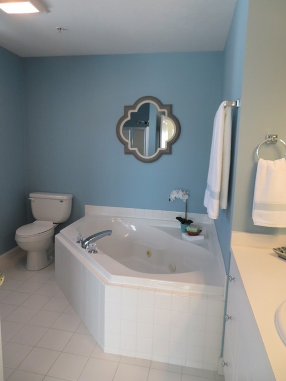 7 Strawberry Lane, Unit A Hudson, MA 01749 - Photo 11 of 20 a bathroom with a toilet and a sink