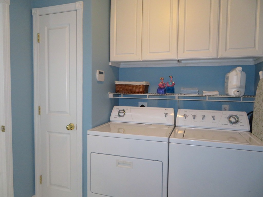 7 Strawberry Lane, Unit A Hudson, MA 01749 - Photo 15 of 20 a utility room with dryer and washer