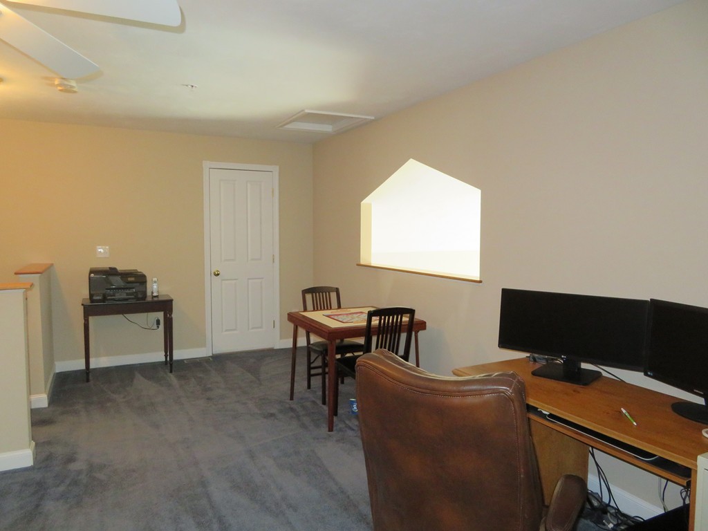 7 Strawberry Lane, Unit A Hudson, MA 01749 - Photo 18 of 20 a view of a workspace with furniture