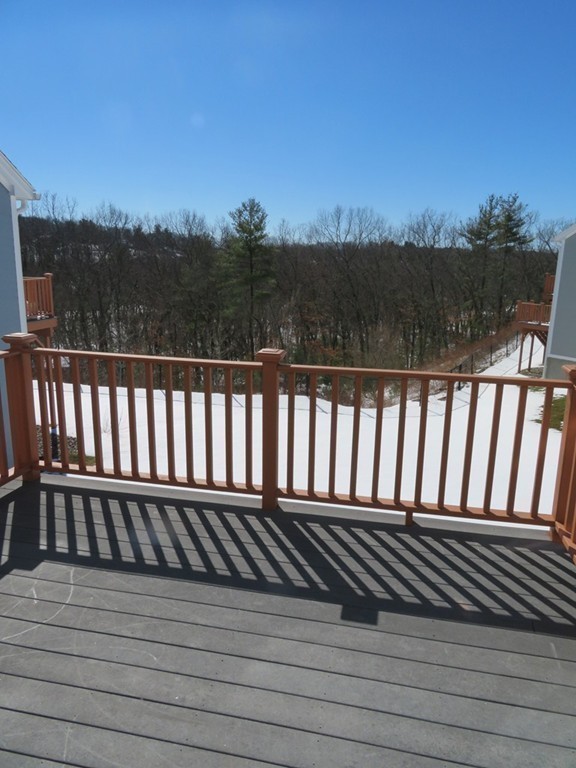 7 Strawberry Lane, Unit A Hudson, MA 01749 - Photo 19 of 20 a view of a black gate