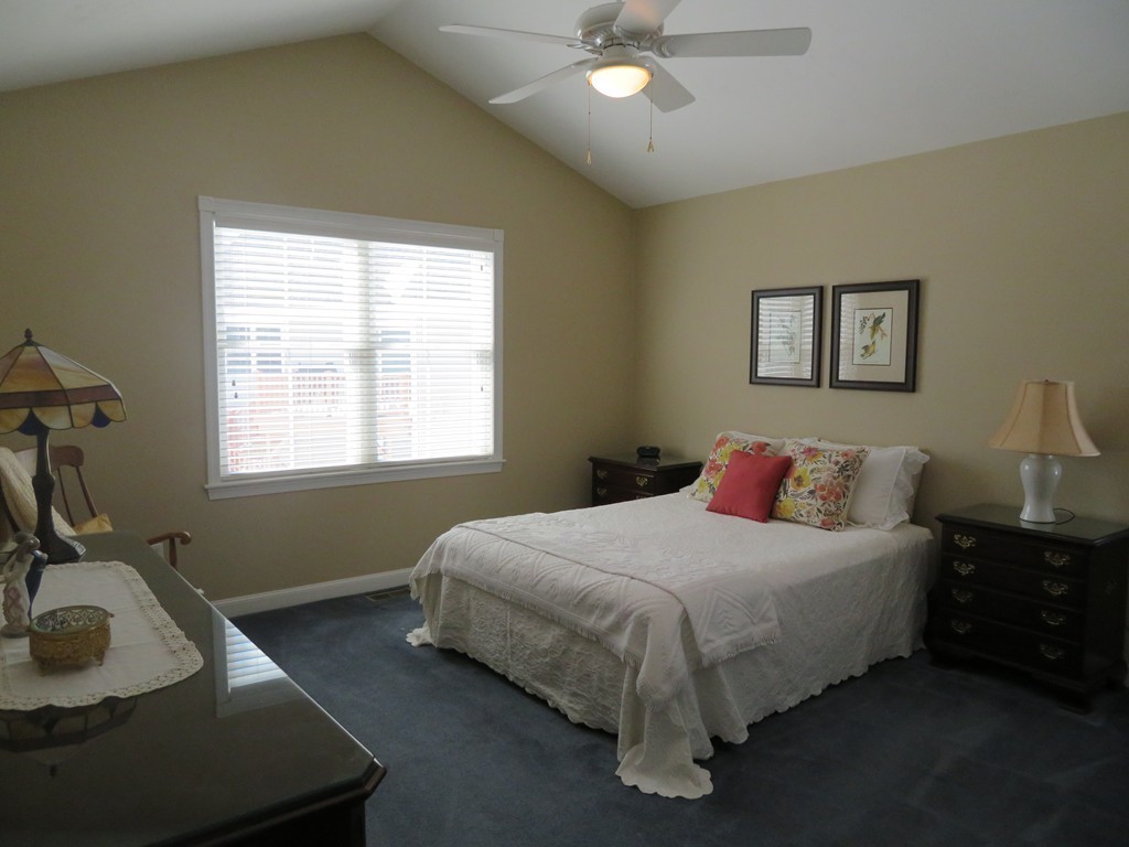 7 Strawberry Lane, Unit A Hudson, MA 01749 - Photo 10 of 20 a bedroom with a bed and a window