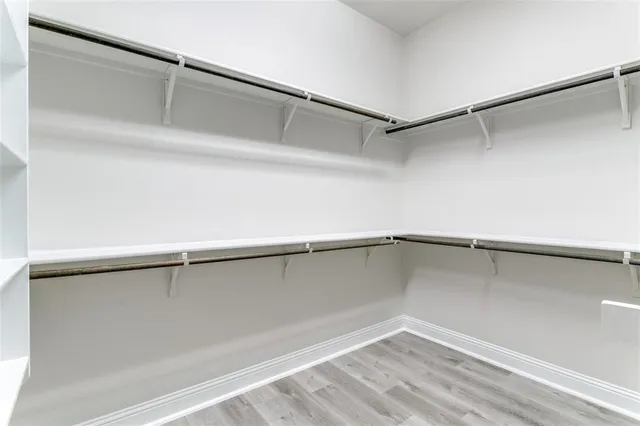 a view of an empty walk in closet