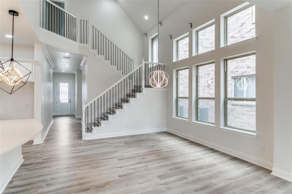523 Paddock Way Irving, TX 75039 - Photo 4 of 23 a view of an entryway with wooden floor