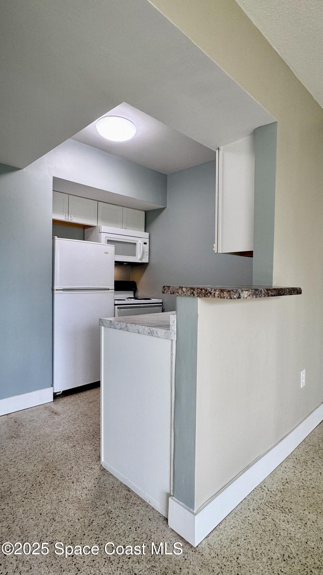 250 North Banana River Drive, Unit F15 Merritt Island, FL 32952 - Photo 6 of 19 250 N Banana River Dr. Unit F15