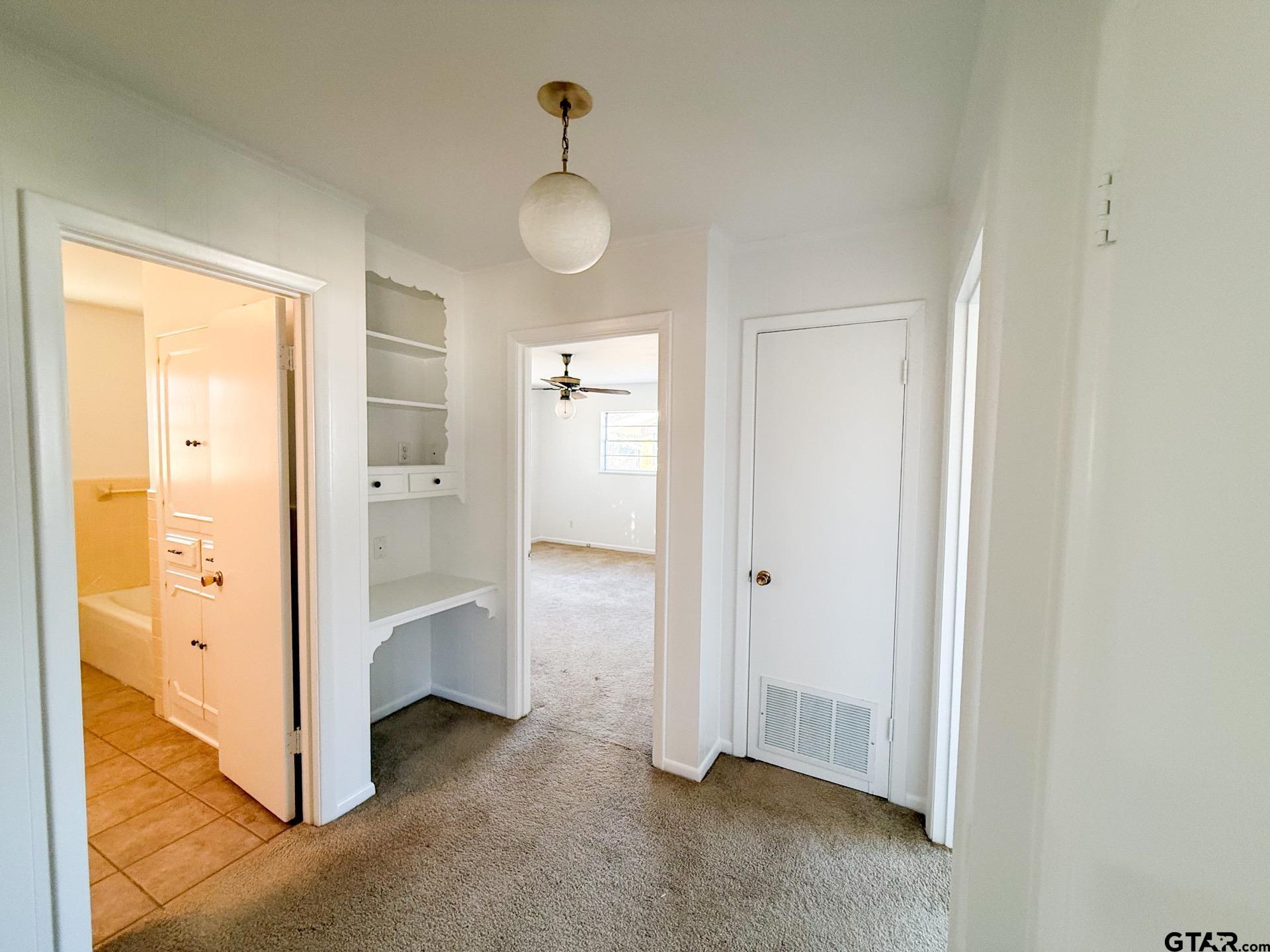 1785 Rollin Road Canton, TX 75103 - Photo 11 of 12 a view of a room with closet and wooden door