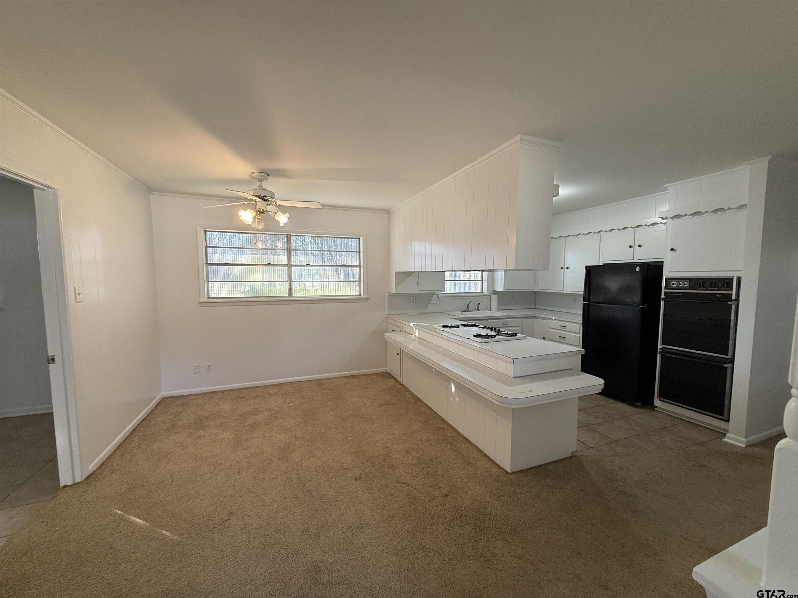 1785 Rollin Road Canton, TX 75103 - Photo 6 of 12 a view of kitchen with refrigerator and window