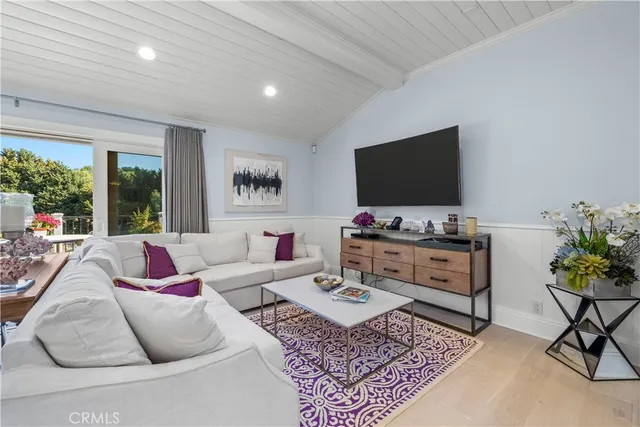 a bathroom with a bathtub and a window