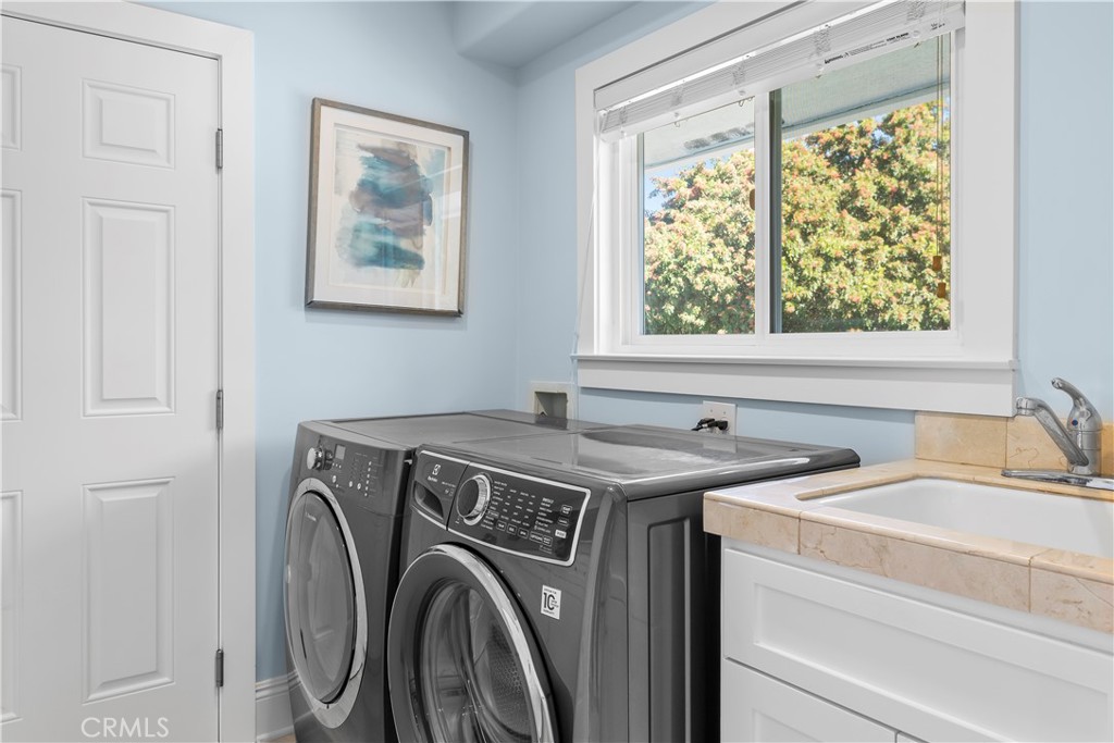 5215 Middlecrest Road Rancho Palos Verdes, CA 90275 - Photo 27 of 53 a utility room with dryer and washer