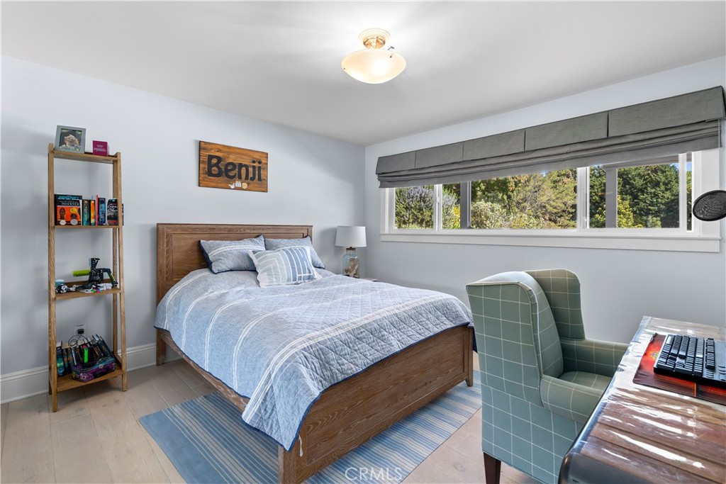 5215 Middlecrest Road Rancho Palos Verdes, CA 90275 - Photo 39 of 53 a bedroom with bed and a couch