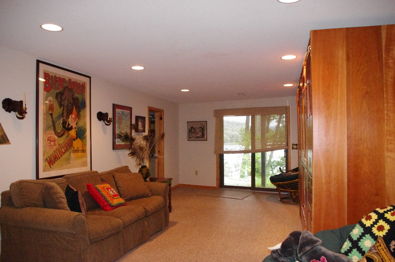 106 Stevens Lake Road Monterey, MA 01245 - Photo 12 of 16 a living room with furniture and a window