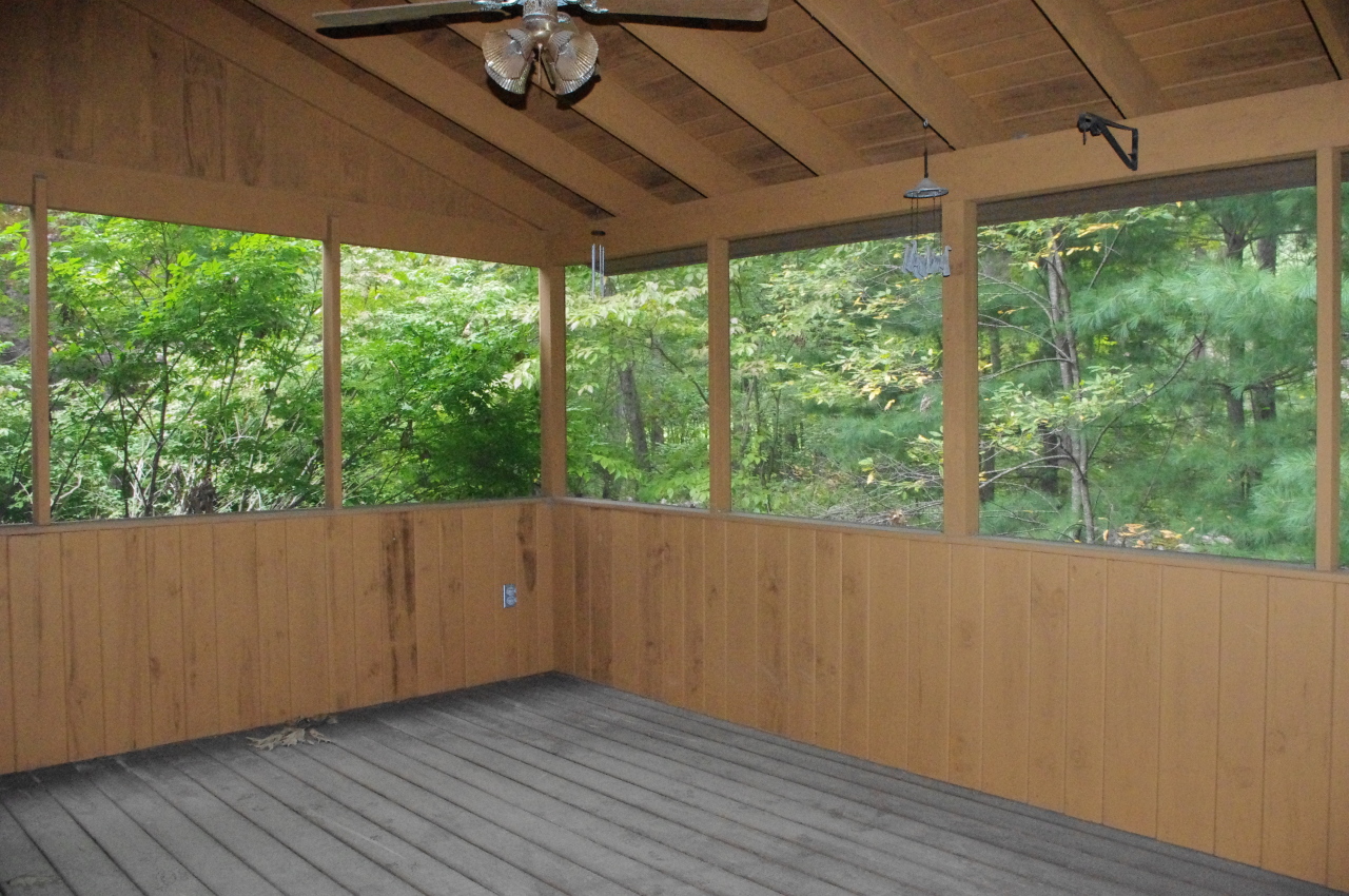 106 Stevens Lake Road Monterey, MA 01245 - Photo 14 of 16 a view of a room with wooden floor and outdoor space