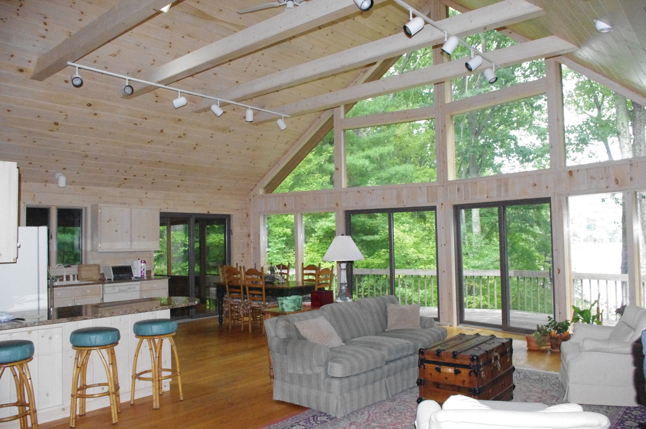 106 Stevens Lake Road Monterey, MA 01245 - Photo 4 of 16 a living room with furniture and a large window