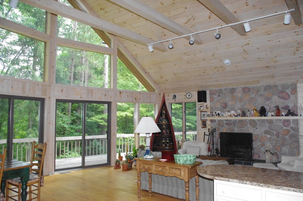 106 Stevens Lake Road Monterey, MA 01245 - Photo 6 of 16 a living room with furniture and a fireplace