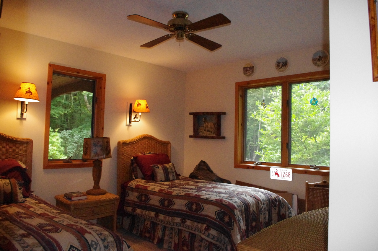 106 Stevens Lake Road Monterey, MA 01245 - Photo 10 of 16 a bedroom with a bed and a window
