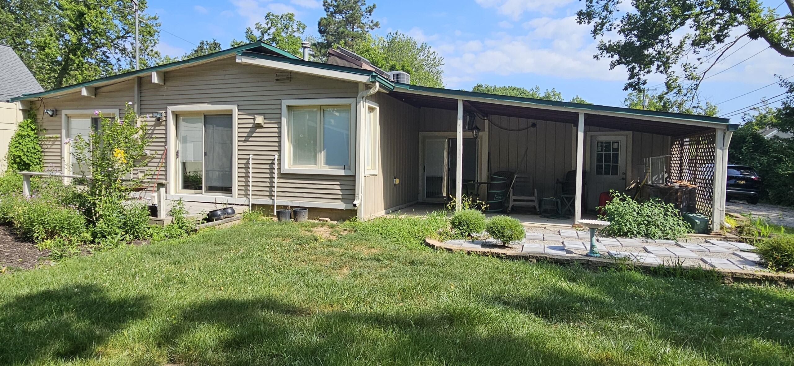 8355 Rucker Road Grosse Ile, MI 48138 - Photo 2 of 10 rucker back house