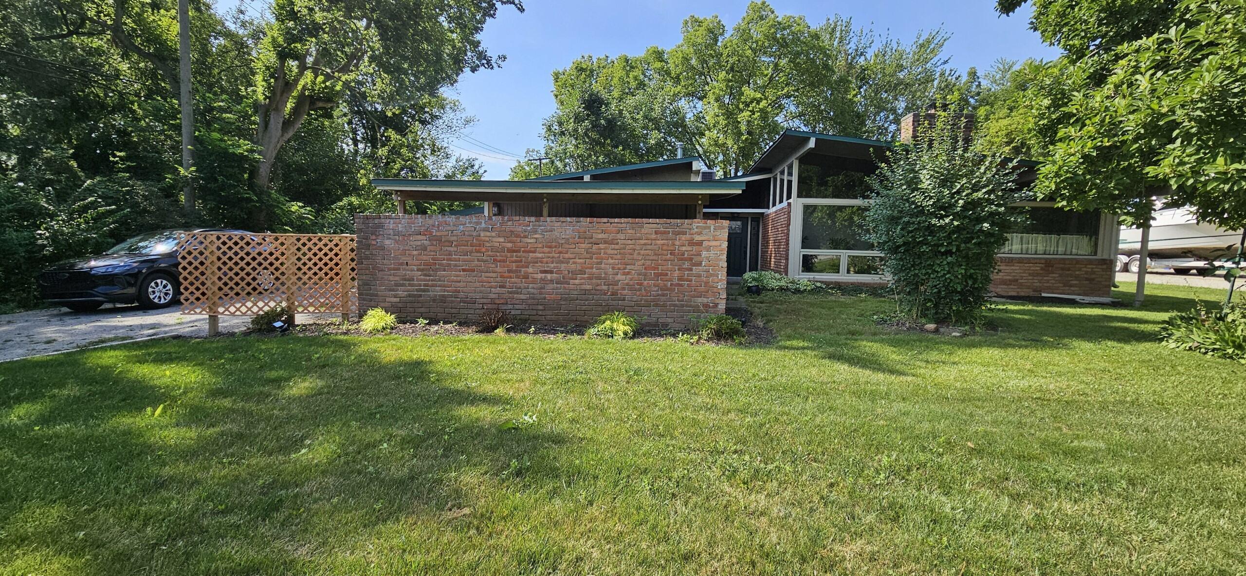 8355 Rucker Road Grosse Ile, MI 48138 - Photo 5 of 10 rucker front side
