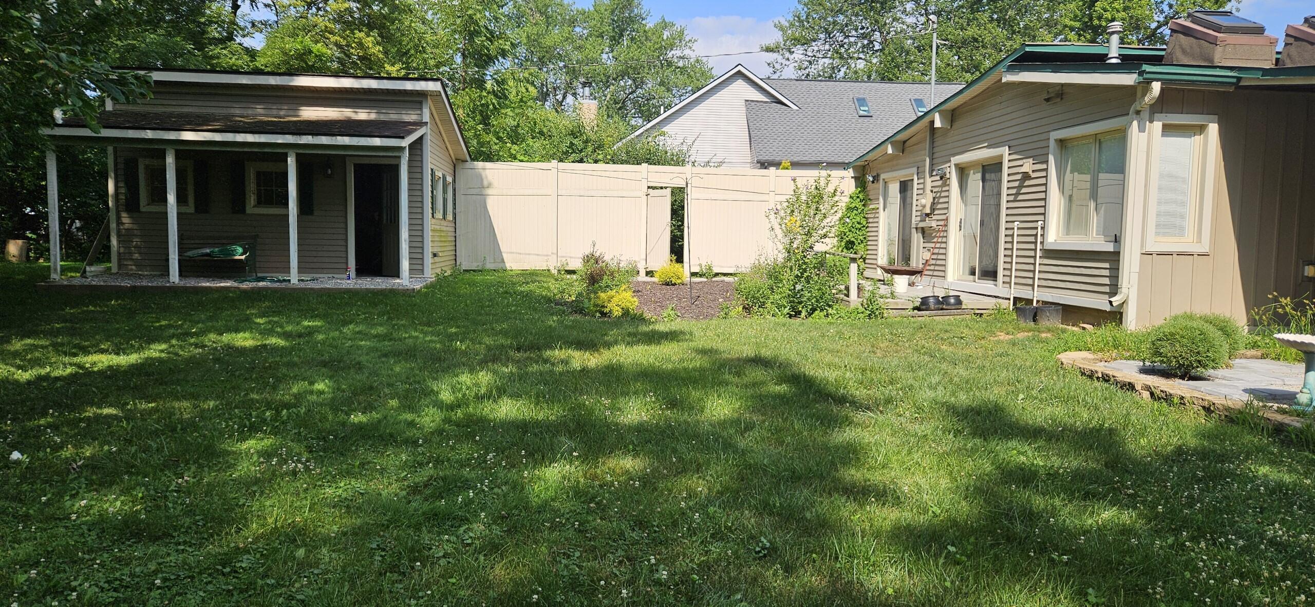 8355 Rucker Road Grosse Ile, MI 48138 - Photo 9 of 10 rucker yard and deck