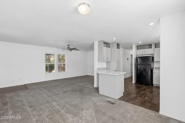 a view of an empty room and window