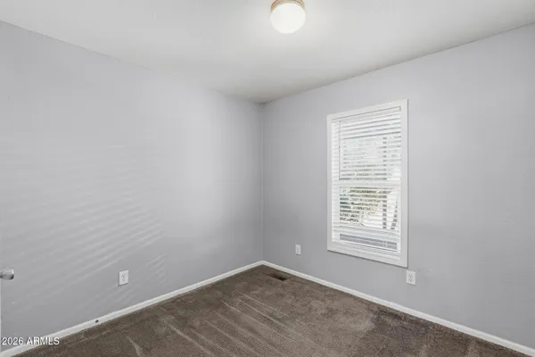 a view of a kitchen with a sink cabinets and window