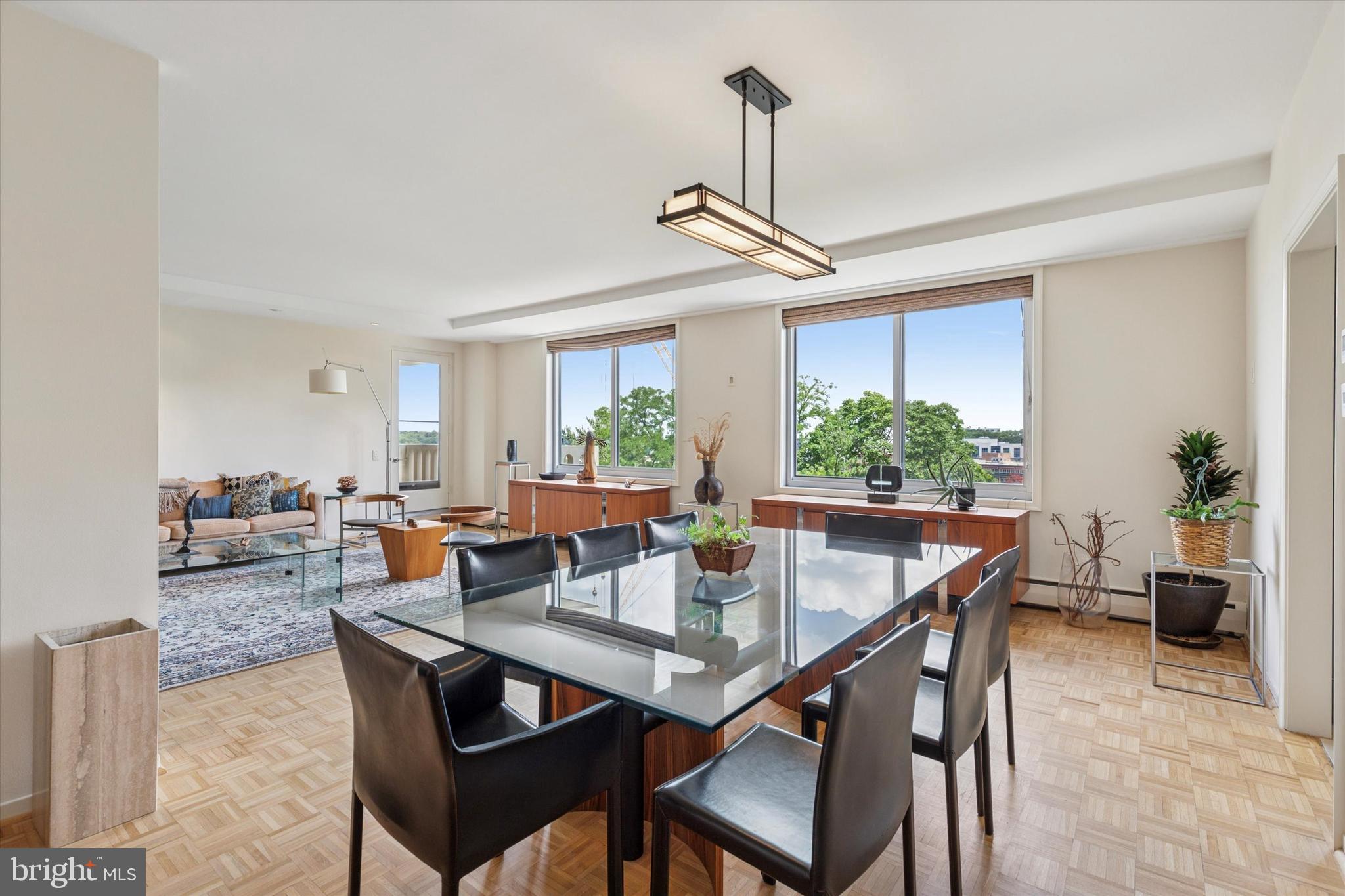 191 Presidential Boulevard, Unit R605 Bala Cynwyd, PA 19004 - Photo 11 of 35 a view of a dining room with furniture window and wooden floor