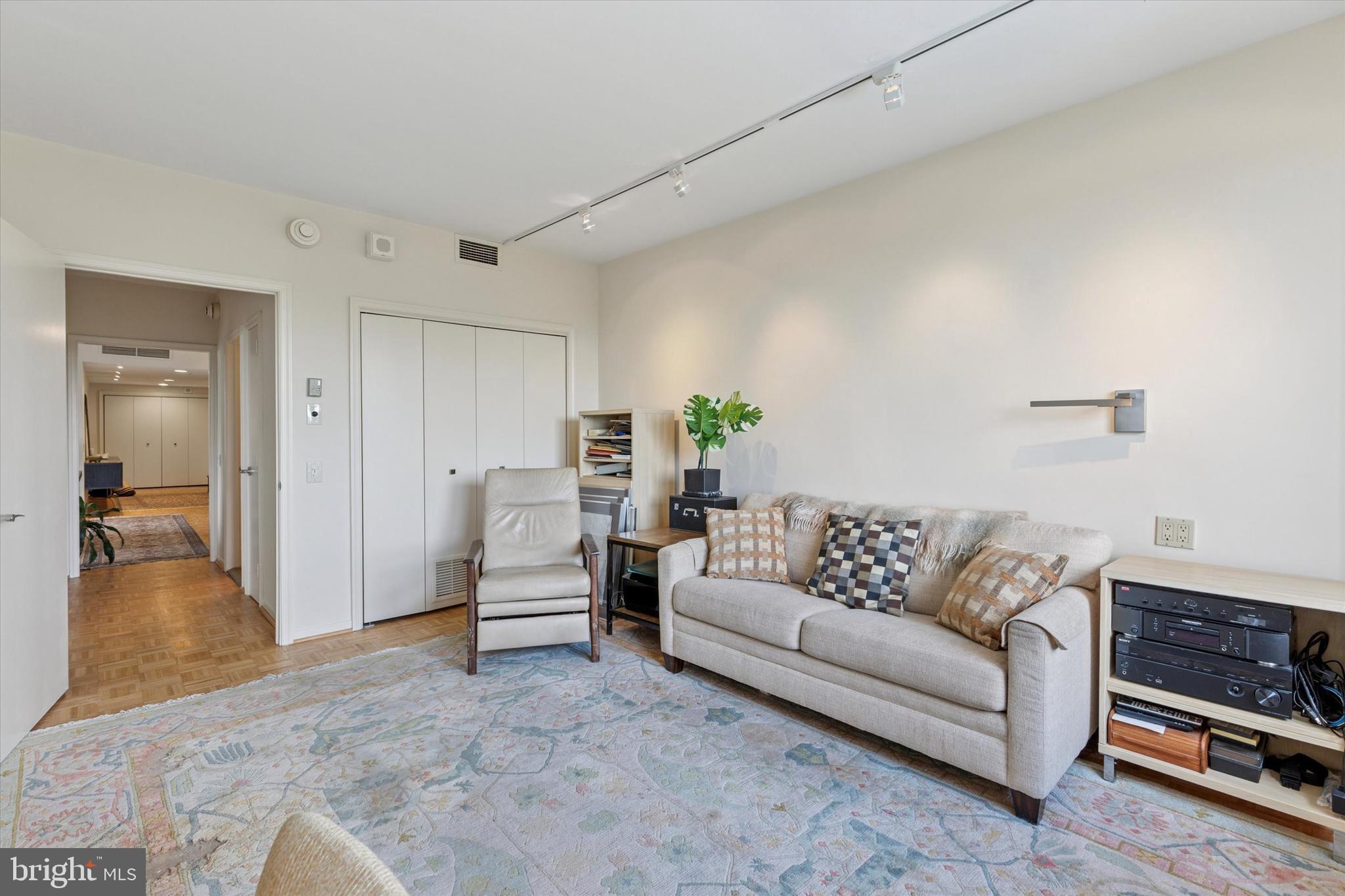 191 Presidential Boulevard, Unit R605 Bala Cynwyd, PA 19004 - Photo 20 of 35 a living room with furniture and a couch