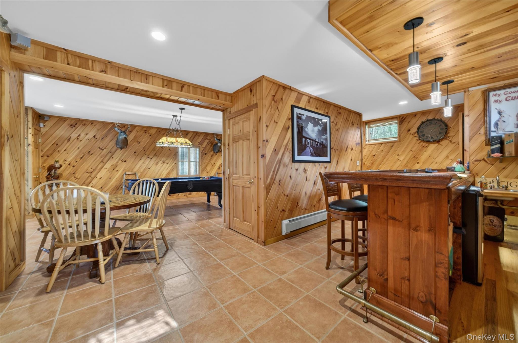 340 Hospital Road Callicoon, NY 12723 - Photo 26 of 41 a dining room with furniture and a floor to ceiling window
